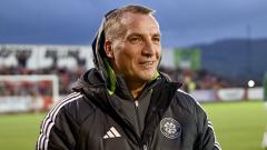 Celtic manager Brendan Rodgers smiles on the sidelines ahead of the game